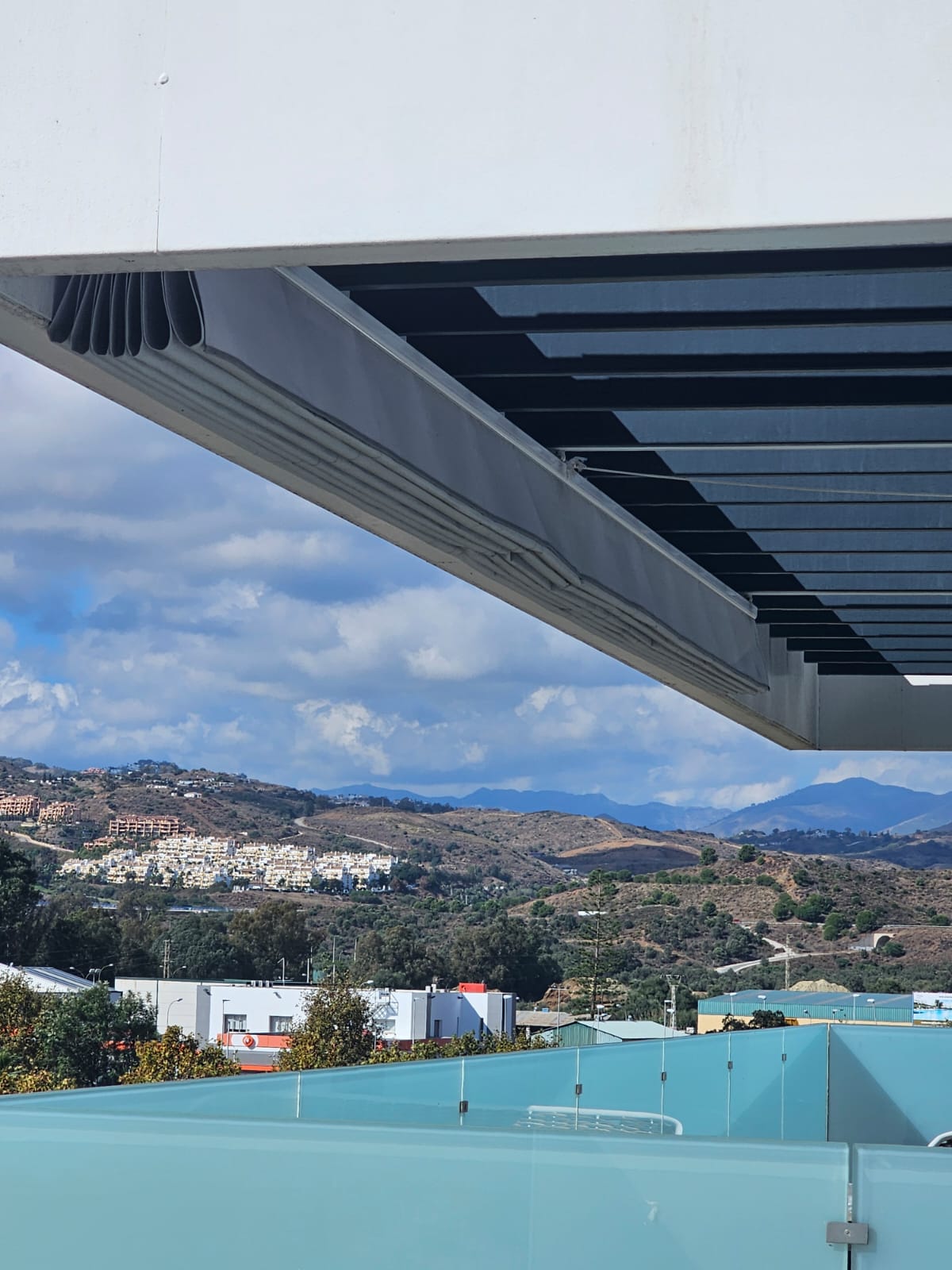 Toldo de Brazo Invisible en Terraza